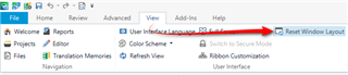 Trados Studio screenshot showing the navigation to View menu with an arrow pointing to Reset Window Layout option.