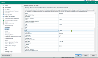 Trados Studio Options dialog box showing Keyboard Shortcuts with a list of commands and their assigned keys, such as Copy to Clipboard Ctrl+C, and an option to Reset to Defaults at the bottom.