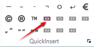Trados Studio screenshot showing the QuickInsert toolbar with an arrow pointing to a newly added button without a distinct icon.