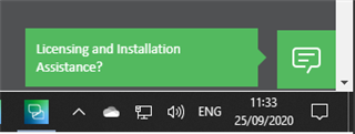 Screenshot showing the 'Licensing and Installation Assistance' dialog in Trados Studio with a chat icon, indicating an option to open an online chat box.