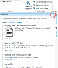 Trados Studio interface showing docked windows with a cursor hovering over the 'X' button to close the 'Useful Tips' window.
