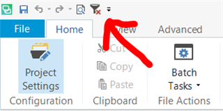 Screenshot of Trados Studio 2019 Editor view with a red arrow pointing to the 'Clear Filter' button located in the top left-hand corner under the 'View' tab.