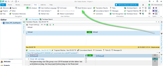Trados Studio interface with a green arrow pointing to the 'Reset Windows Layout' button in the 'View' tab to resolve a closed preview window issue.