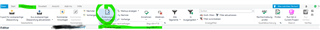 Trados Studio screenshot showing the ribbon with various icons and a green checkmark indicating successful action, with some text blurred out.