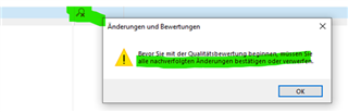 Warning message in Trados Studio stating 'Before you can confirm the quality evaluation, you must confirm or reject all subsequent changes.' with an OK button.