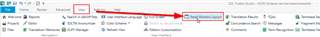 Screenshot of Trados Studio interface showing the Translation Memory Results window being moved, with a red arrow pointing to the 'Reset Window Layout' button.