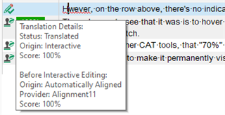 Close-up of Trados Studio segment showing 'Translated' status, '100%' score, and 'Automatically Aligned' origin from provider 'Alignment11'.