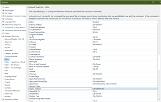 Screenshot of Trados Studio options menu displaying 'Keyboard Shortcuts - Default' list with various commands and shortcuts under 'Editor' category, no errors or warnings visible.