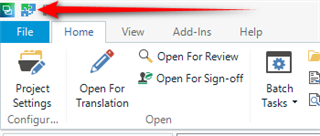 Close-up of Trados Studio's top menu highlighting the 'File' tab with a red arrow.