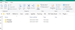 Windows File Explorer showing SDL Trados Studio Plugins folder with subfolders named Packages and Unpacked.