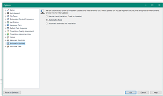 Trados Studio options menu screenshot with 'Automatic Updates' section visible, showing that the 'Automatic check' option is not selected.