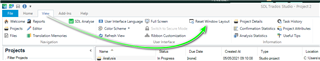 Trados Studio screenshot showing the 'View' tab with an arrow pointing to 'Reset Window Layout' option.