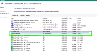 Control Panel showing list of installed programs, with SDL Freshstart version 1.0.3.2 highlighted indicating correct installation location.