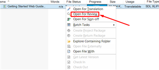 Trados Studio screenshot showing the 'File' menu expanded with 'Open for Review' option highlighted by a red arrow.