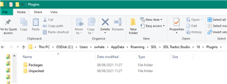 File Explorer window inside 'Plugins' folder of Trados Studio with 'Packages' and 'Unpacked' folders visible.