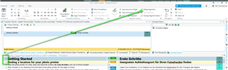 Trados Studio editor with segment 1 selected and a cursor placed for splitting, merge and split options now active.