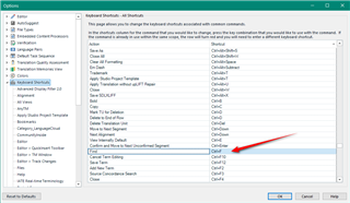 Trados Studio Options dialog box showing Keyboard Shortcuts settings with a red arrow pointing to a potential duplicate shortcut.