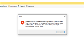 Error message in SDL Trados Studio stating some files could not be downloaded due to 'UserId' property on 'LanguageFileVersionComplex' being set to a 'null' value instead of 'Guid'.
