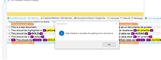 Trados Studio screenshot showing a spell checker dialog box with a message 'Spell checking is complete; no spelling errors were found.'