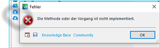 Error dialog box in Trados Studio with a red 'X' icon, stating 'Die Methode oder der Vorgang ist nicht implementiert,' which translates to 'The method or operation is not implemented.' Buttons for 'Knowledge Base' and 'Community' are visible, along with an 'OK' button.