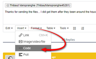 Screenshot showing the 'Insert' button highlighted in the Trados Studio interface with an arrow pointing to the 'Code' option.