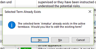 Screenshot of Trados Studio showing a dialog box titled 'Selected Term Already Exists' with an information icon and message stating 'The selected term 'Armatur' already exists in the active termbase. Would you like to edit the existing term?' with options 'Yes', 'No', and 'Cancel'.