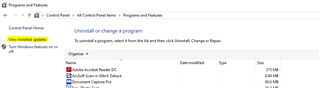 Control Panel window showing 'Uninstall or change a program' with MultiTerm Version 9 Update 7 highlighted for uninstallation.