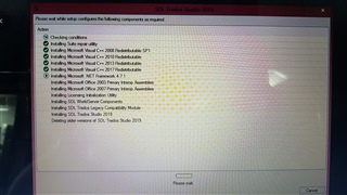 Installation screen showing progress of various components for Trados Studio 2019 with no visible errors.