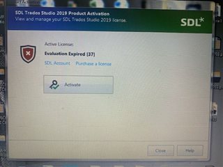 SDL Trados Studio 2019 Product Activation window showing an error with a red cross icon, text reads 'Evaluation Expired 37' with options to 'SDL Account' and 'Purchase a license'.