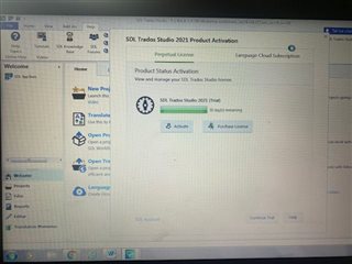 SDL Trados Studio 2021 Product Activation window with no visible errors, options to 'Activate' and 'Purchase License' are available.
