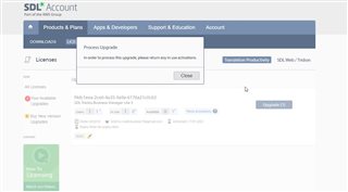 Screenshot of SDL Account page showing an error message 'Process Upgrade - In order to process this upgrade, please verify with us at email protected' with a close button.