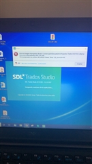 Error message on a computer screen over the SDL Trados Studio application stating 'The application was unable to start correctly (0xc000007b). Click OK to close the application.'