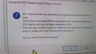 Security warning about an unsigned SDL Trados Studio plugin found, asking if the user wants to load the plugin.