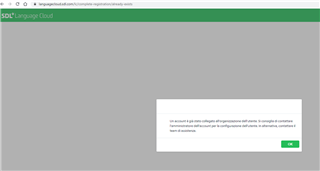 SDL Language Cloud webpage with a message 'An account has already been linked to the user's organisation. Contact the account administrator for user configuration or the support team.' with an 'OK' button.