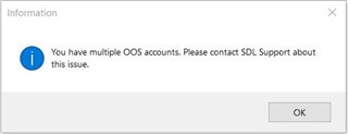 Information dialog box in Trados Studio with an error message stating 'You have multiple OOS accounts. Please contact SDL Support about this issue.' with an OK button.