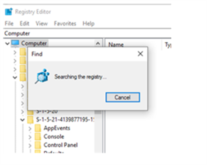 Registry Editor window displaying a progress dialog with text 'Searching the registry...' and a cancel button.