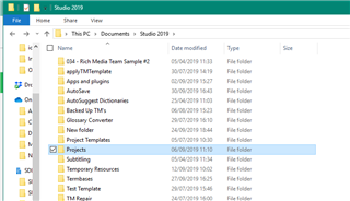Screenshot of a Windows file explorer showing a list of folders inside 'Studio 2019' directory, including 'Projects', 'Translation Memories', and 'Termbases'.