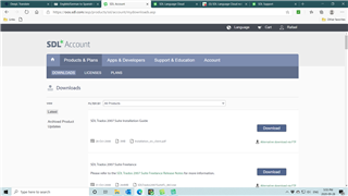 Screenshot of Trados Studio account connection showing the Downloads tab with options for software and updates, and a 'Download' button for the latest product update.