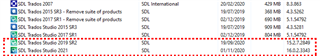 Screenshot of Trados Studio uninstallation options showing multiple versions with a red error message indicating a removal issue.