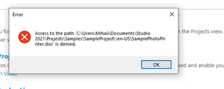 Error message in Trados Studio stating 'Access to the path C:UsersMihaiDocumentsStudio 2021ProjectssampleSampleProjecten-USsamplePhotoPrinter.doc is denied.' with an OK button.