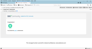 Screenshot of SDL Community webpage with a notification message saying 'Congratulations! You earned a badge: Achievement'.