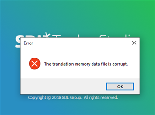 Error message window on Trados Studio stating 'The translation memory data file is corrupt.' with an OK button.
