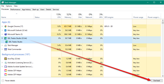 Windows Task Manager showing multiple instances of Trados Studio running with high memory usage.