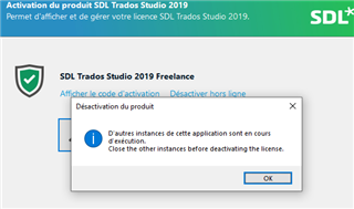 SDL Trados Studio 2019 activation window with an error message stating 'Other instances of this application are running. Close the other instances before deactivating the license.' with an OK button.