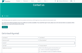 Screenshot of Trados Studio 'Contact us' page with a form to get in touch by email, requesting details such as first name, last name, email, and company name.