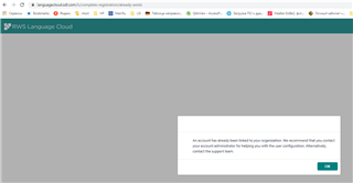 Error message on RWS Language Cloud webpage stating 'An account has already been linked to your organization. We recommend that you contact your account administrator for helping you with the user configuration. Alternatively, contact the support team.' with an OK button below.