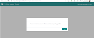 Screenshot of Trados Studio login error message stating 'An error occurred on our side while processing the request. Try again later.' with an OK button.