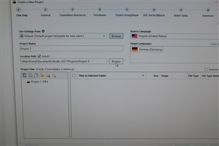 Trados Studio 'Create a New Project' window with cursor hovering over 'Browse' button next to 'Location Path' field, and 'English (United States)' selected as Source Language.