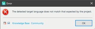 Error dialog box in Trados Studio stating 'The detected target language does not match that expected by the project.' with an OK button, Knowledge Base, and Community links.