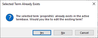A dialog box titled 'Selected Term Already Exists' with a message asking if the user wants to edit the existing term 'propri t s' in the active termbase, with options 'Yes', 'No', and 'Cancel'.